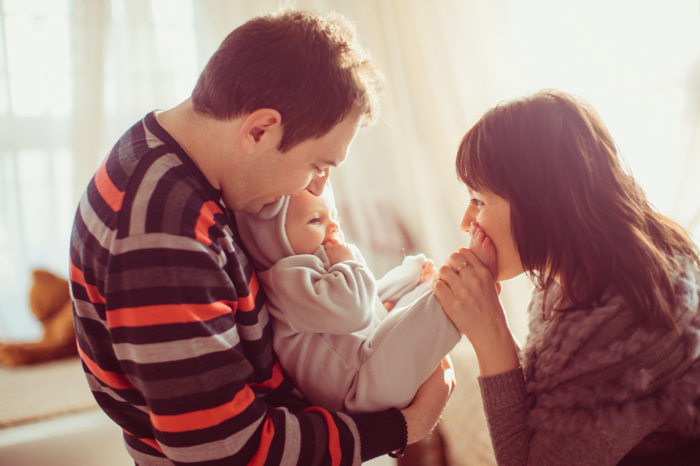 happy parent with newborn